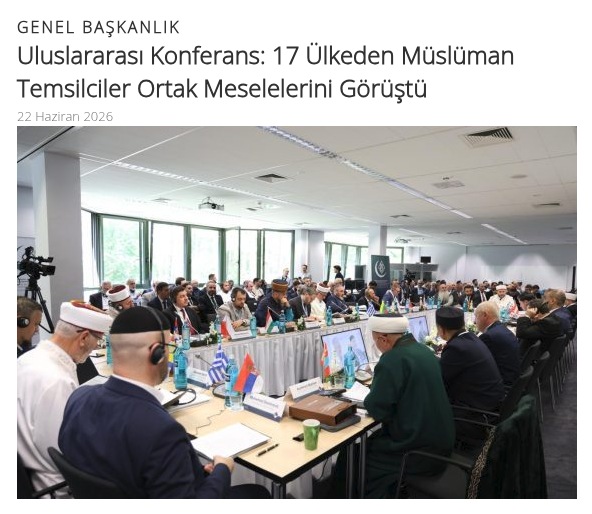 Bildschirmausschnitt einer türkischsprachigen Meldung auf igmg.org vom 22. Juni 2026 mit Überschrift, Datum und einem Foto einer Konferenz mit Teilnehmern an einer langen Tischreihe.